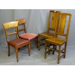 A PAIR OF LATE 18TH/EARLY 19th CENTURY OAK COUNTRY CHAIRS having tall one piece centre slats on