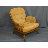 AN ERCOL WINDSOR JUBILEE STICK BACK EASY CHAIR re-upholstered in 2012, 81cms height, 79cms width,