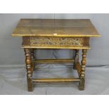 AN 18TH CENTURY OAK SIDE TABLE with an overhanging top to a narrow drawer with carved and scrolled