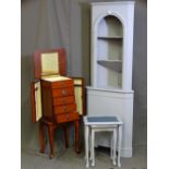 A PAINTED CORNER STANDING CUPBOARD with dentil cornice, a similar painted nest of tables and a