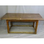 A PINE REFECTORY TABLE, on square corner supports with narrow turn stretchers, 77cms height,