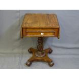 A REGENCY MAHOGANY WRITING TABLE with twin flaps and twin end drawers with writing surface