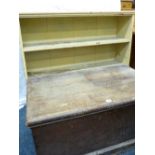 A PINE CARPENTER'S CHEST, no interior box and a three shelf painted open bookcase