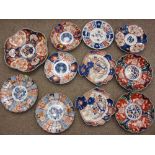 IMARI PLATES, a fan shaped pair, two other pairs and a quantity of other Imari plates