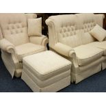 TWO PIECE LOUNGE SUITE comprising a well maintained floral, oatmeal upholstery two seater winged