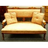 A NEATLY PROPORTIONED EDWARDIAN CARVED SALON COUCH with classical carved detail and turned front