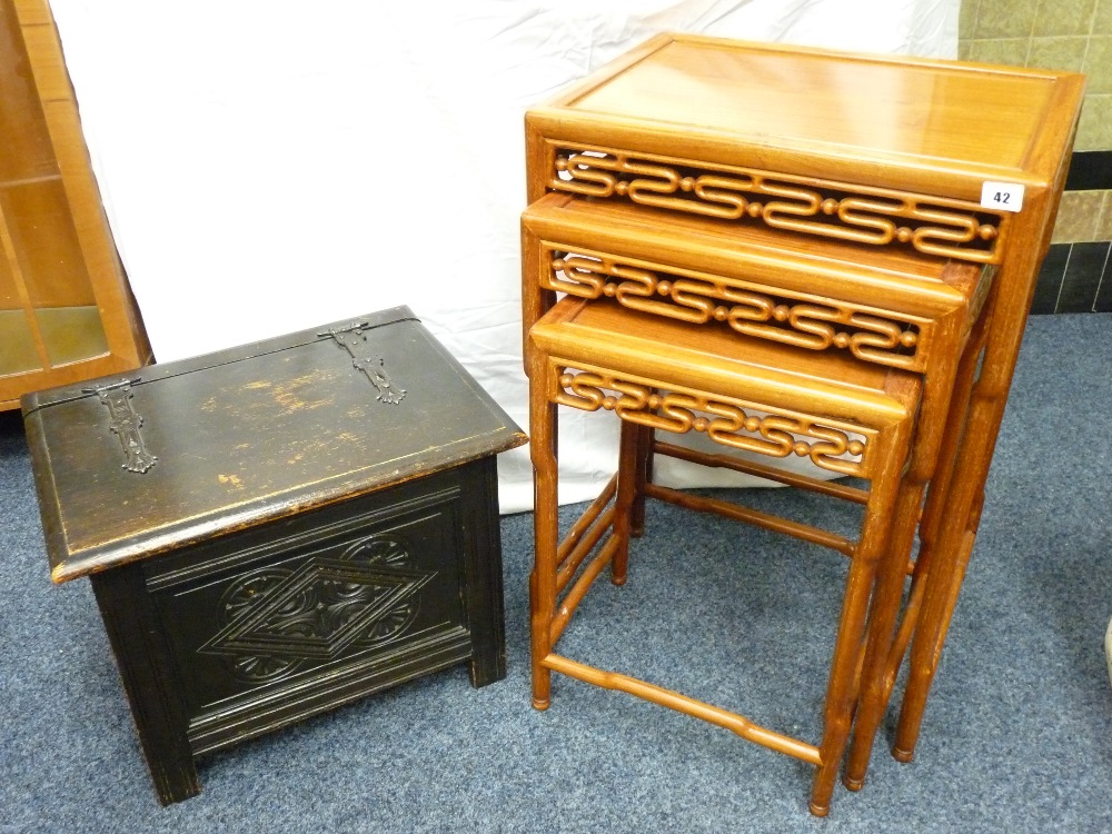 ORIENTAL HARDWOOD COFFEE TABLES, a nest of three oblong topped with patterned aprons and 'bamboo