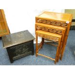 ORIENTAL HARDWOOD COFFEE TABLES, a nest of three oblong topped with patterned aprons and 'bamboo