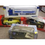 FOUR BOXED SCALE MODEL DIECAST VEHICLES, various makes