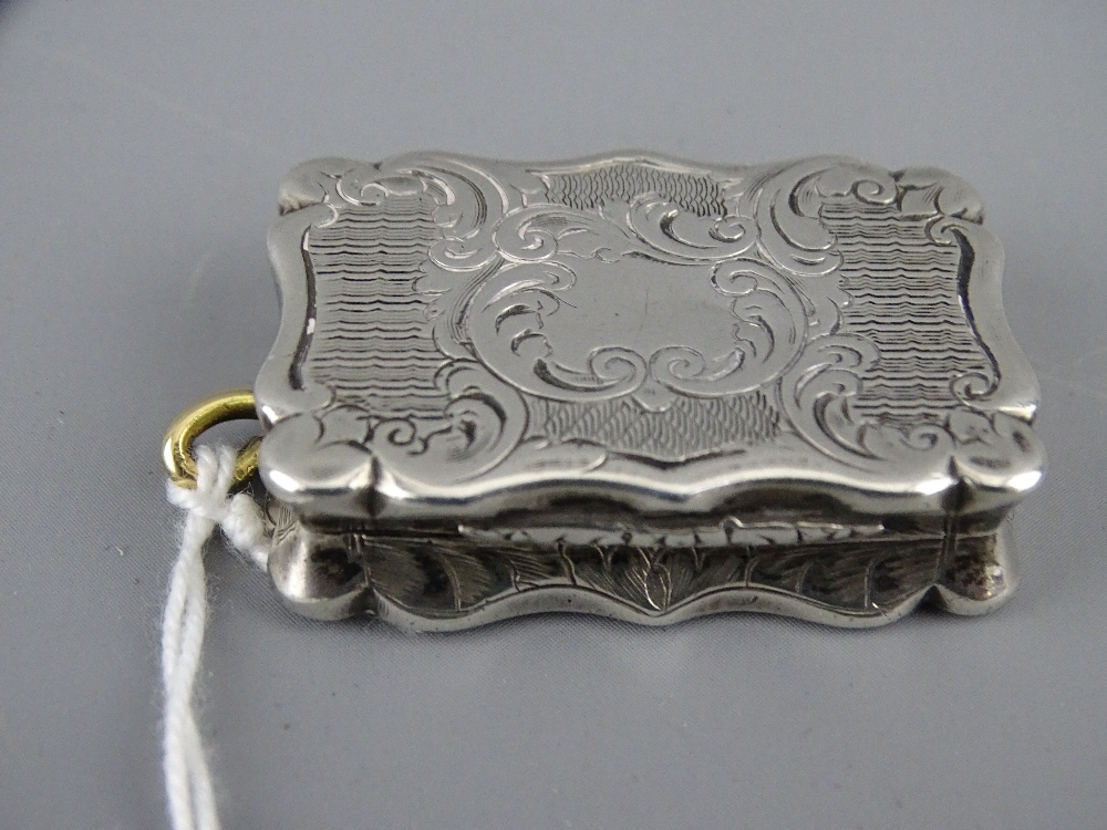 A VICTORIAN SILVER VINAIGRETTE with gilt interior grill, Birmingham 1854, makers John Yapp and