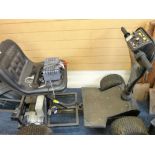 A GOOD FOUR WHEEL GOLF BUGGY with batteries and a 'Hillbilly' electric trolley with battery