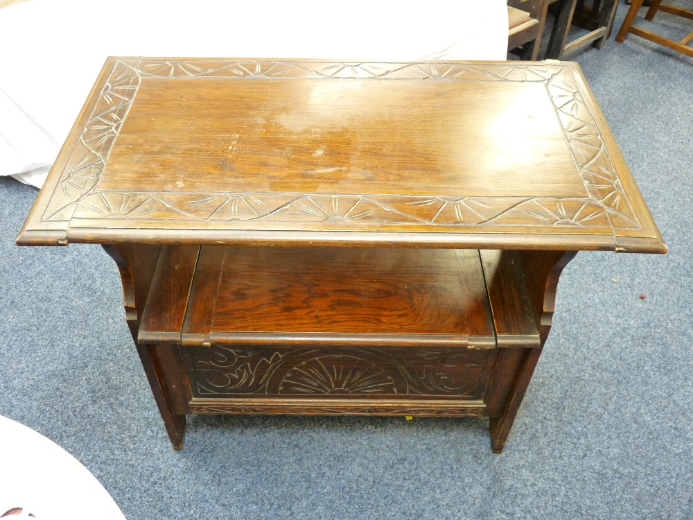 A SMALL POLISHED MONKS BENCH with carved lions mask lid and carved front to a box seat - Image 2 of 2