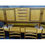 AN EXCELLENT G PLAN LONG SIDEBOARD, extending dining table and six ladder back chairs, 79cms height,