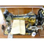 FRISTER AND ROSSMANN HAND SEWING MACHINE in a mahogany case, the machine well decorated in the