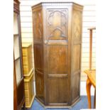 A POLISHED HALL ROBE with inset carved and plain panels