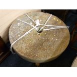 AN ANTIQUE STONE MILLER'S GRINDING WHEEL, 78cms diameter, 13.5cms thick