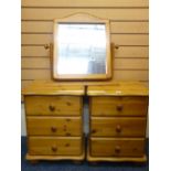 TWO SMALL MODERN PINE CHESTS each have three drawers and a pine framed toilet mirror on a platform