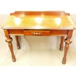 A GOOD VICTORIAN MAHOGANY HALL TABLE with shallow back rail, single central frieze drawer with