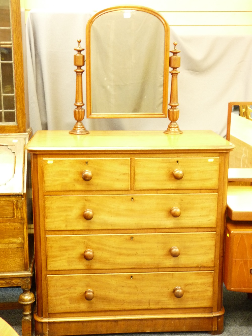 A VICTORIAN MAHOGANY CHEST of two short over three long drawers, having turn wood knobs and an