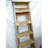 A SET OF VINTAGE WOODEN FOLDING STEP LADDERS