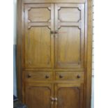 A CIRCA 1820 FLOOR STANDING PINE CORNER CUPBOARD, twin upper and lower panelled doors with diamond