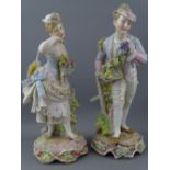 FINELY PRESERVED PAIR OF DRESDEN FIGURINES, a young lady and beau, each holding flowers and fruit