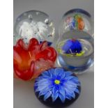 THREE GOOD SIZED GLASS PAPERWEIGHTS, another and an art glass dish