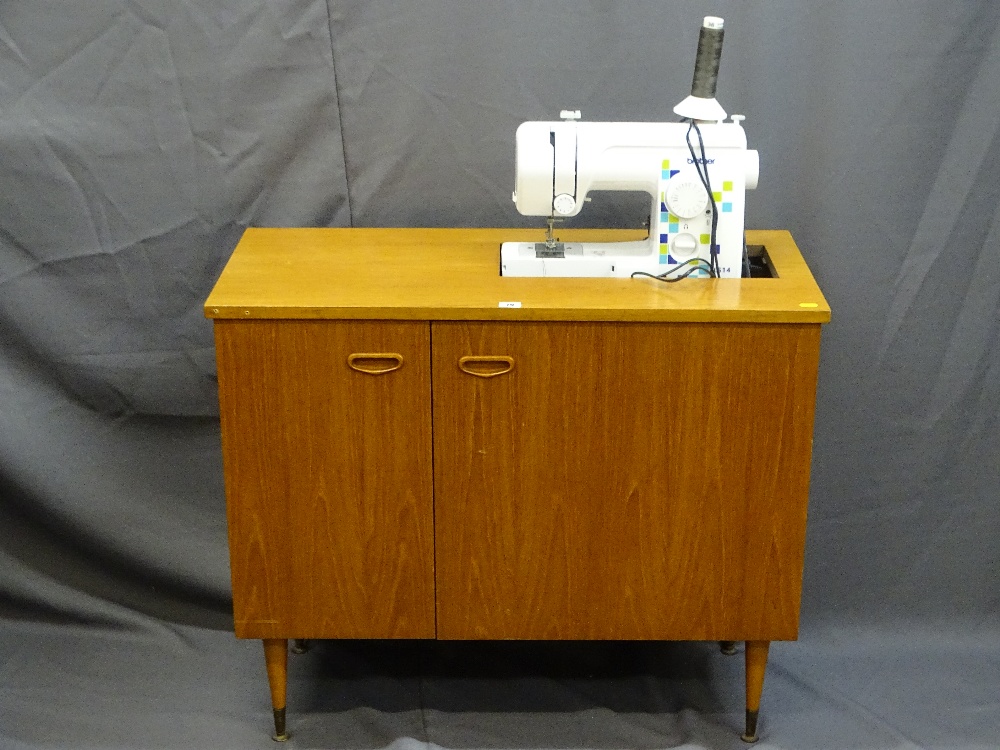 A BROTHER LS14 SEWING MACHINE IN CABINET with power lead and foot pedal, E/T, 65.5cms height,