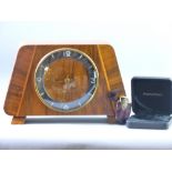 A VINTAGE WALNUT MANTEL CLOCK and a modern Prometheus agate effect lady's lighter, boxed