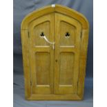 AN OAK GOTHIC STYLE RECESS WALL CUPBOARD, dual twin panel doors opening to reveal interior shelves
