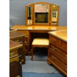 A REPRODUCTION MAHOGANY MIRRORED DRESSING TABLE, stool and matching four drawer chest with a pair of