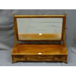 A REGENCY MAHOGANY SWING TOILET MIRROR on a three drawer base with box wood string inlay, 59.5cms