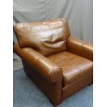 A MULTI YORK BROWN LEATHER EFFECT ARMCHAIR, 80cms height, 97cms width, 64cms seat depth