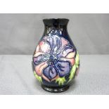 A MOORCROFT 'ANEMONE' BULBOUS VASE, 14cms high