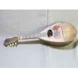A VINTAGE MANDOLIN with mother of pearl inlay and a polished wooden brass dialled barometer along