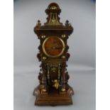 VINTAGE GERMAN BOY ON A SWING PENDULUM MANTEL CLOCK, the movement stamped 'Lenzkirch', No 676280,