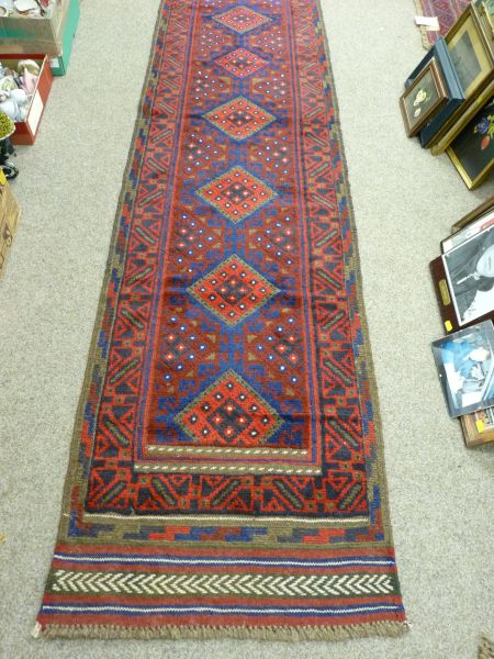 MESHWANI CARPET RUNNER - tonal red ground with repeating central diamond block pattern and double