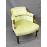 LIGHT GREEN BUTTON BACK UPHOLSTERED TUB CHAIR on shaped front supports with castors