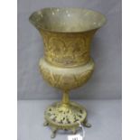 INDIAN CHASE DECORATED GILT BRASS CAMPANA STYLE VASE on a circular pierced leaf six footed stand,
