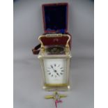 SILVER PLATED BRASS CASED CARRIAGE CLOCK in original carry case with key, the dial signed 'Tarori