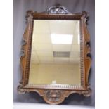 GILLOWS STAMPED OAK FRAMED MIRROR, 118 x 79cms, carved outer details and rib pattern surrounding a