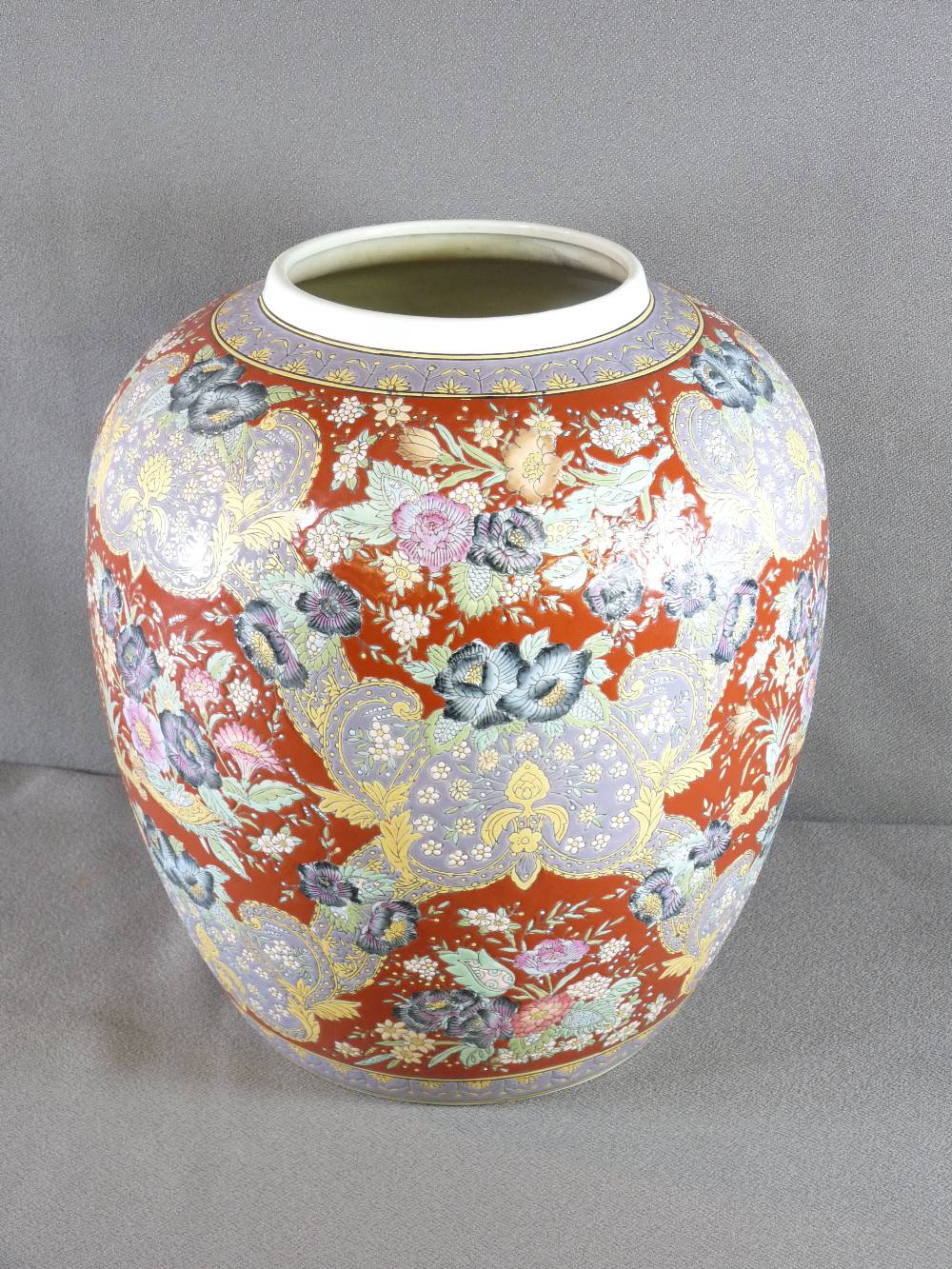 LARGE CHINESE POTTERY JAR, enamel decorated, deep rust red ground with allover floral swag