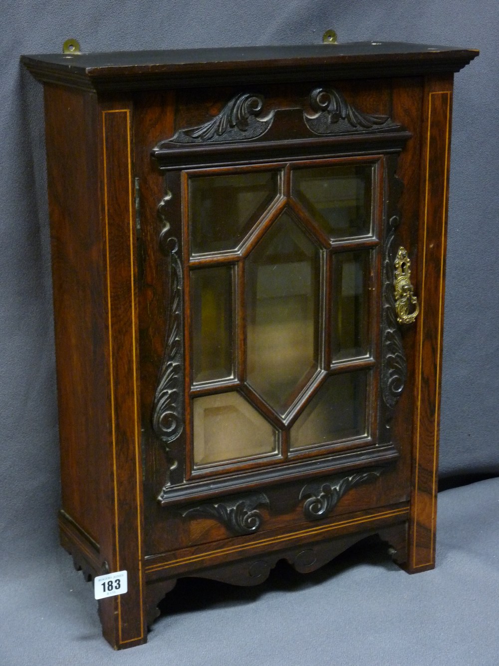 LINE INLAID ROSEWOOD WALL CABINET with bevel edged glass door panels, 53.5cms height, 39cms max