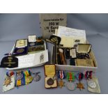 FAMILY GROUP OF WWI & WWII MEDALS, EPHEMERA & ASSOCIATED MATERIAL including, a WWI group of three