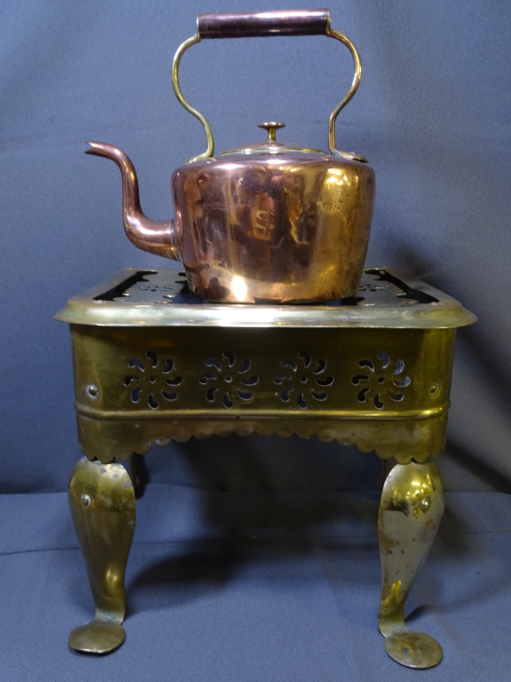 GOOD BRASS FOOTMAN and an antique copper kettle