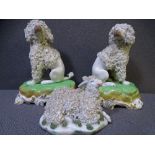 PAIR OF DRESDEN POODLES on plinths, 13cms high and a similar sheep ornament