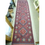 MESHWANI CARPET RUNNER - red ground with block cross pattern border and central repeating diamond