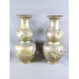 LARGE PAIR OF CHINESE POLISHED BRONZE DOUBLE GOURD VASES, the upper and lower areas entwined with