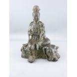 CHINESE CAST BRONZE FIGURINE OF GUANYIN seated upon an elephant holding a lotus flower sceptre,