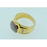 18CT YELLOW GOLD OPAL & DIAMOND RING featuring one solid opal with eight round brilliant cut
